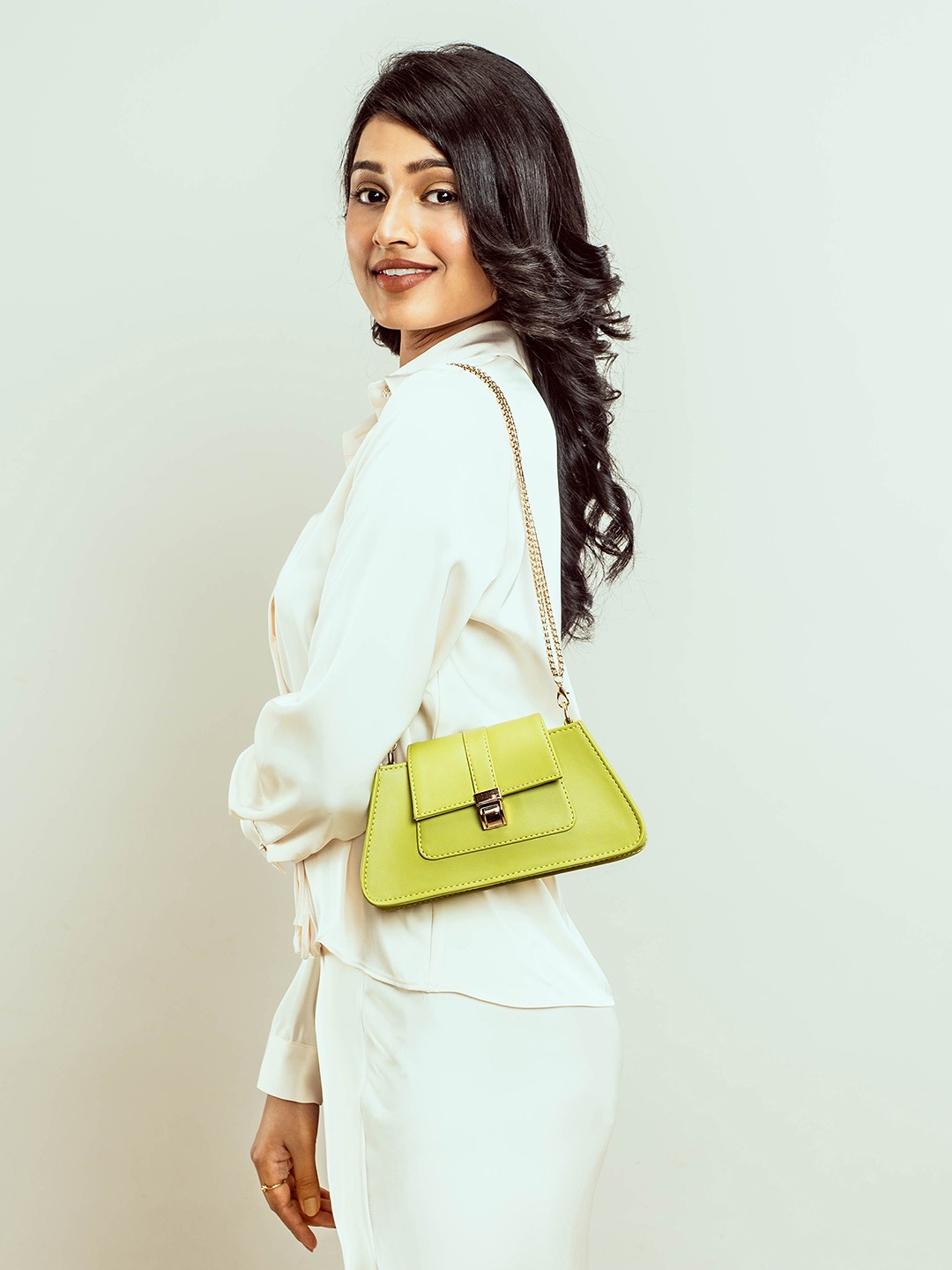 

Strokes by Namrata Mehta Women Solid Structured Sling Bag, Lime green