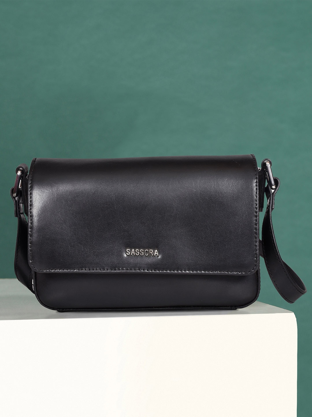 

Sassora Women Solid Structured Leather Sling Bag, Black