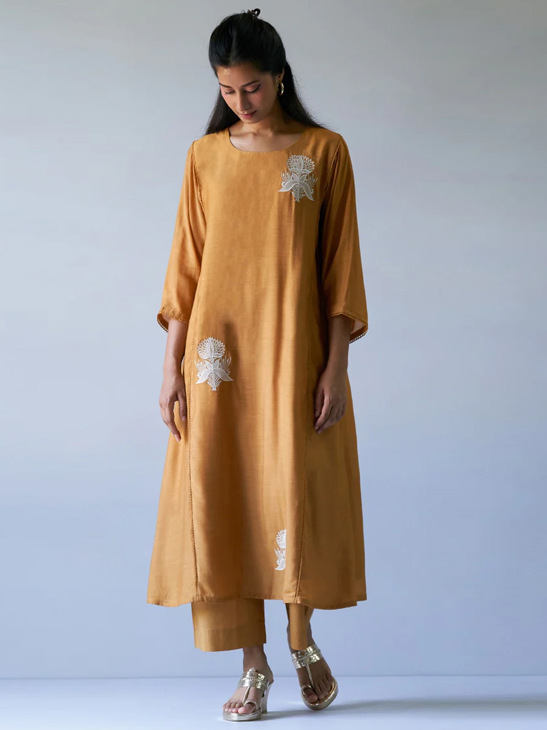 

Ganga Women Gold-Toned Floral Embroidered Regular Thread Work Raw Silk Kurta with Trousers