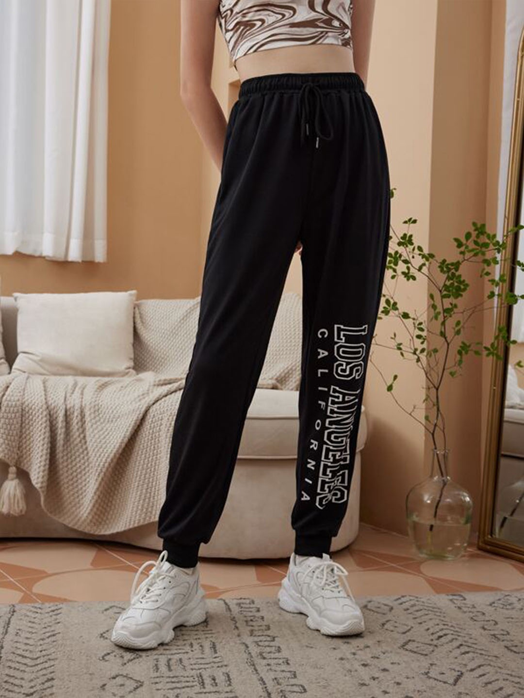 

TABADTOD Women Printed Relaxed Mid-Rise Stretchable Joggers, Black