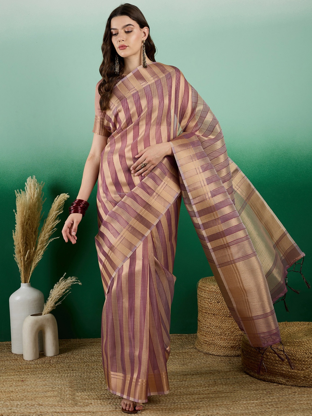 

A.V.M Prints Women Striped Zari Saree, Peach