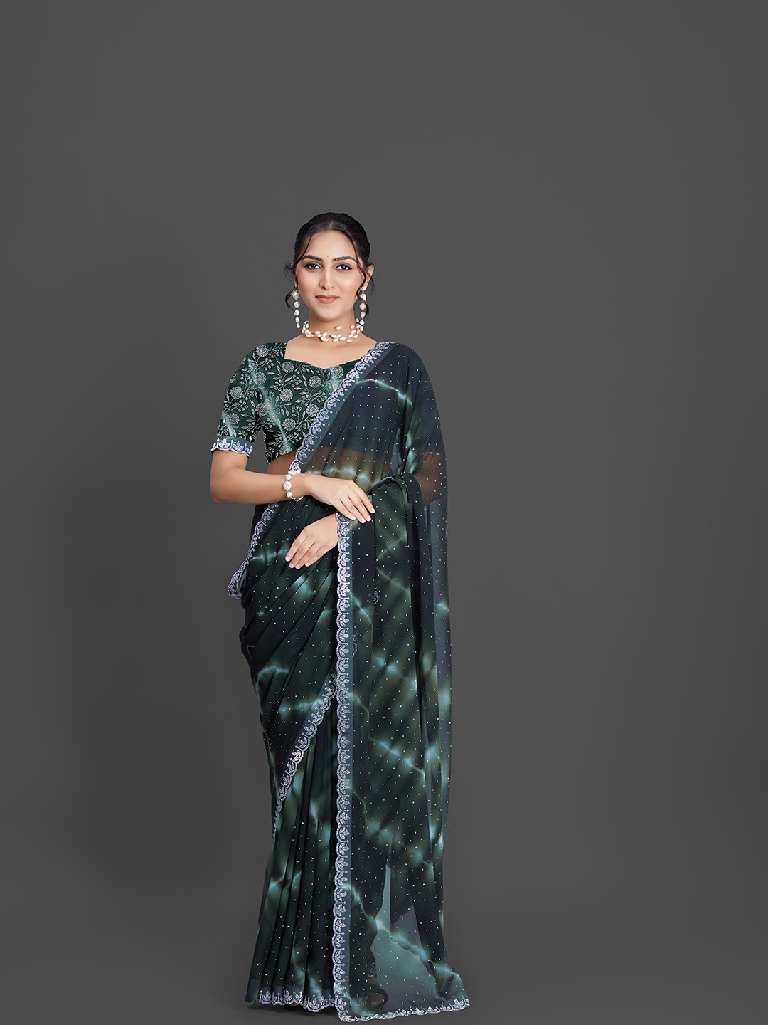 

A.V.M Prints Tie and Dye Sequinned Pure Georgette Saree, Green