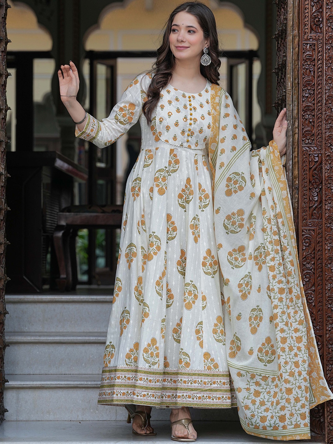 

Mizaz Women Floral Printed Layered Mirror Work Pure Cotton Kurta with Trousers & With Dupatta, Mustard