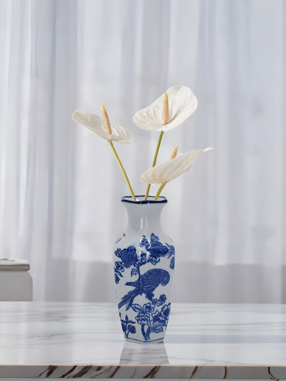 

The Decor Lane White & Blue Floral Printed Ceramic Pottery Vase