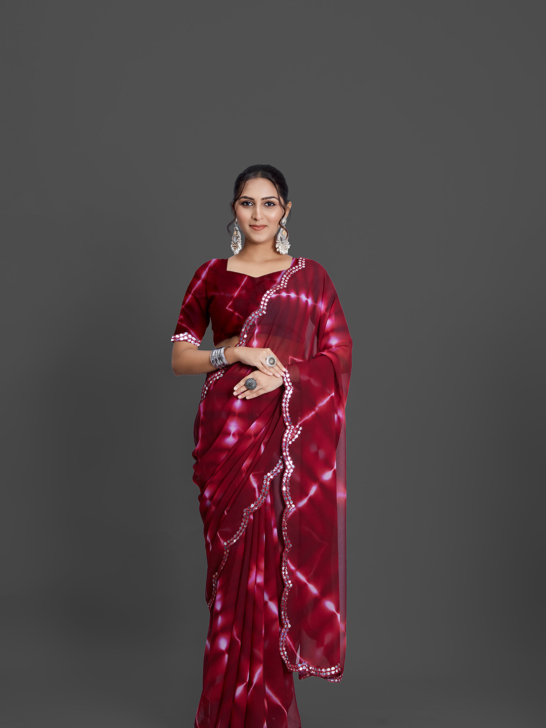 

A.V.M Prints Tie and Dye Sequinned Pure Georgette Saree, Magenta