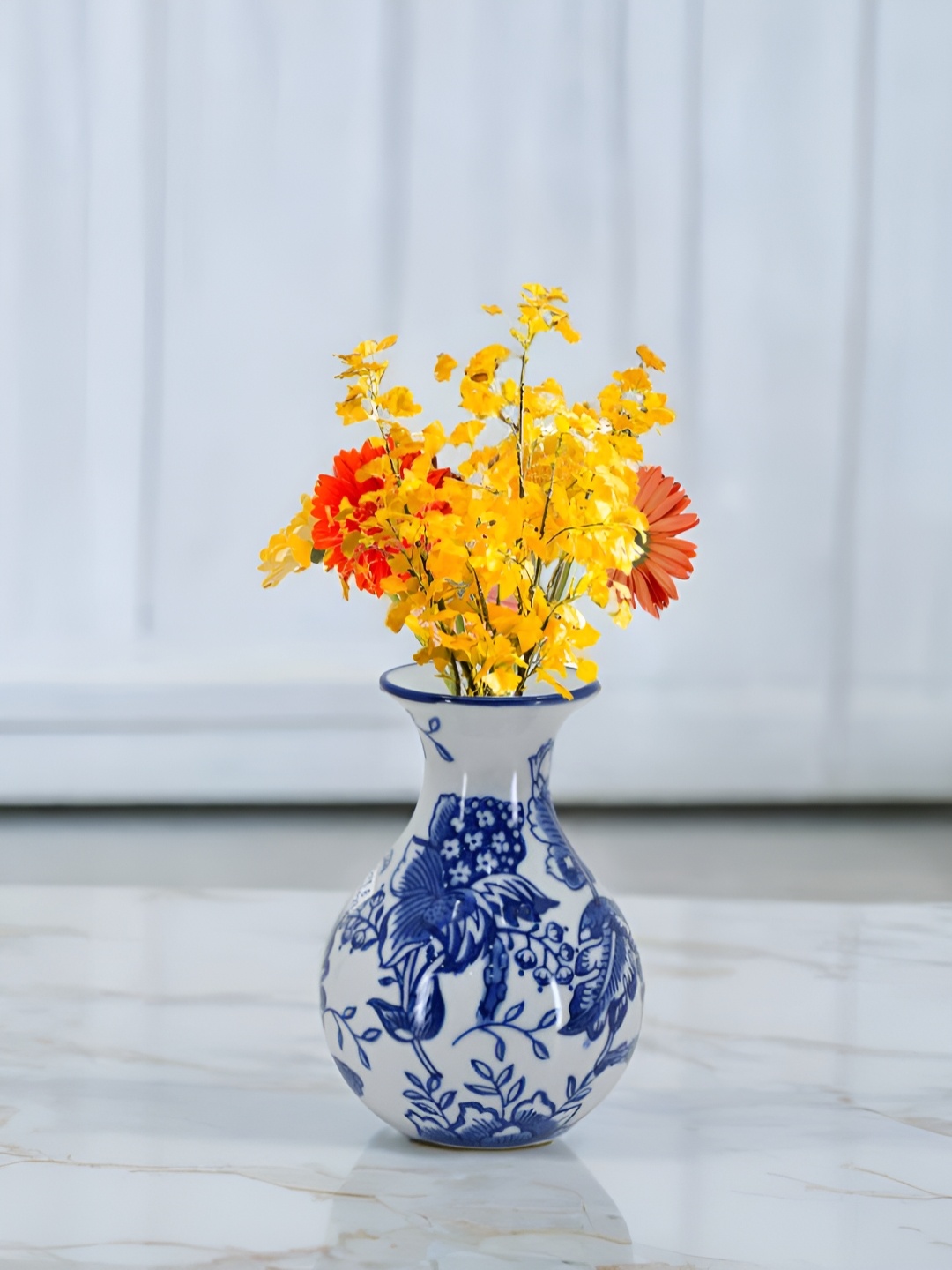 

The Decor Lane White & Blue Floral Printed Ceramic Pottery Vase