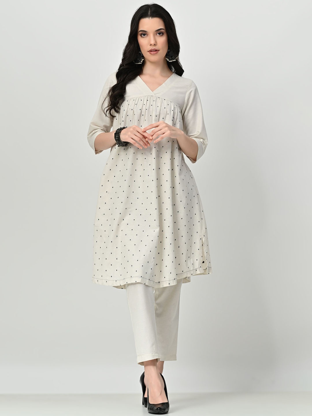 

BAESD Geometric Embroidered V-Neck Pleated A-Line Kurta With Trousers, Cream