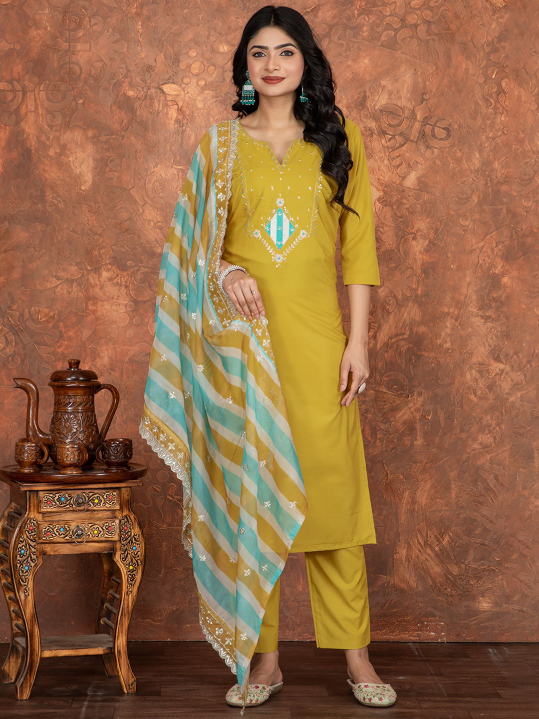 

Divyadham Textiles Women Floral Embroidered Regular Sequinned Kurta with Trousers & With Dupatta, Mustard