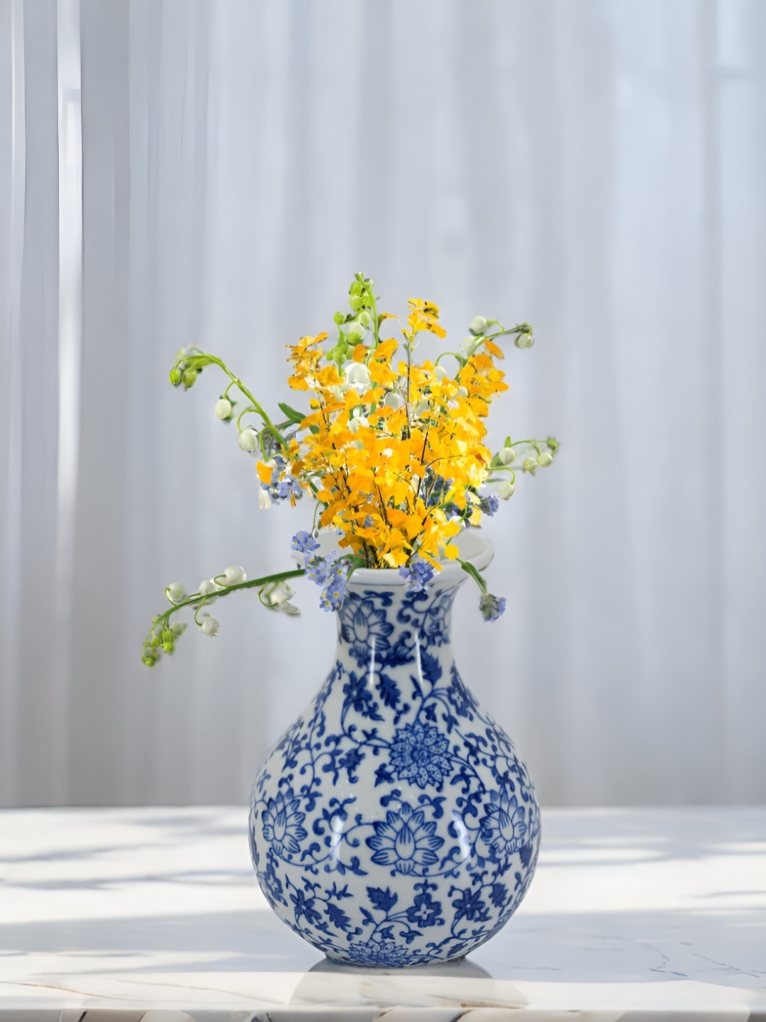 

The Decor Lane Blue & White Floral Printed Ceramic Pottery Vase