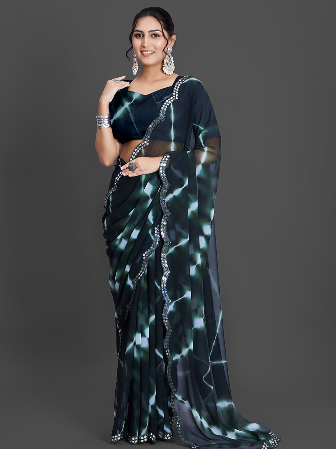 

A.V.M Prints Tie and Dye Embellished Mirror Work Pure Georgette Saree, Green