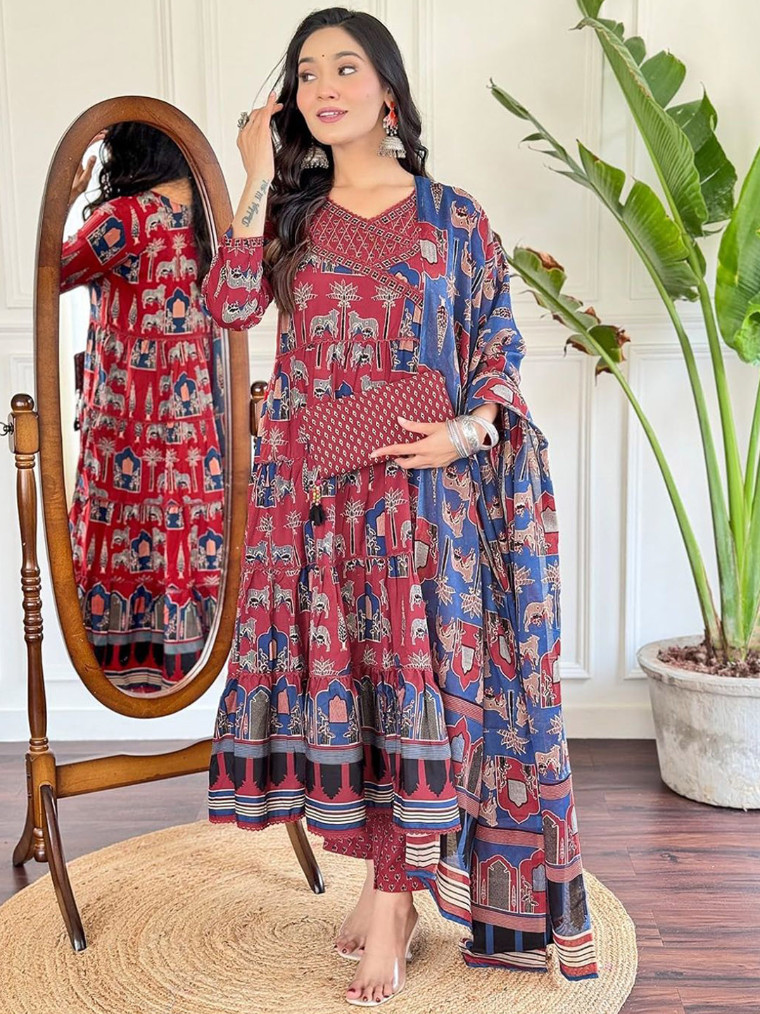 

PARTHVI Women Printed Regular Thread Work Pure Cotton Kurta with Trousers & With Dupatta, Red
