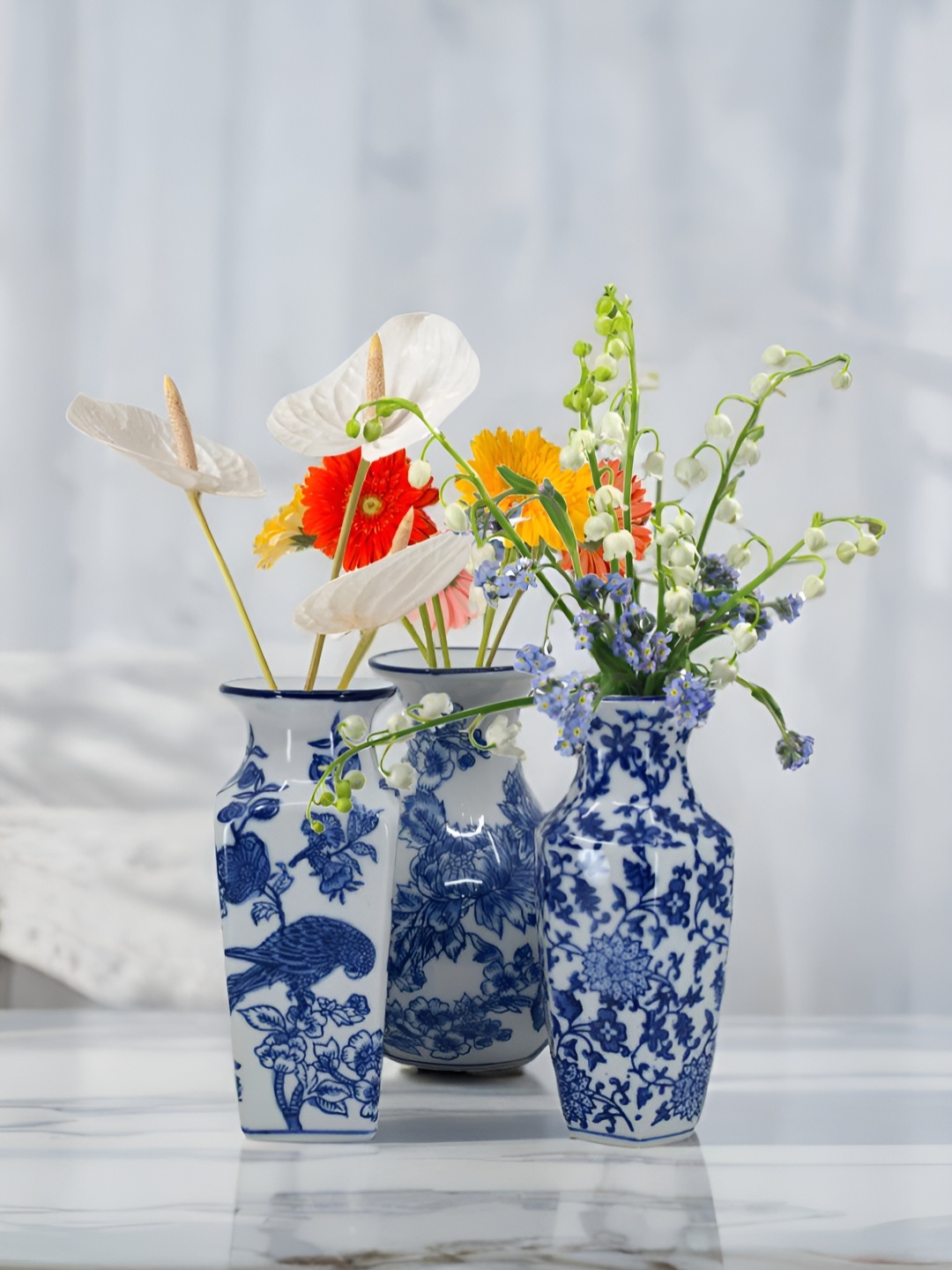 

The Decor Lane White & Blue 3 Pieces Floral Printed Ceramic Pottery Vase