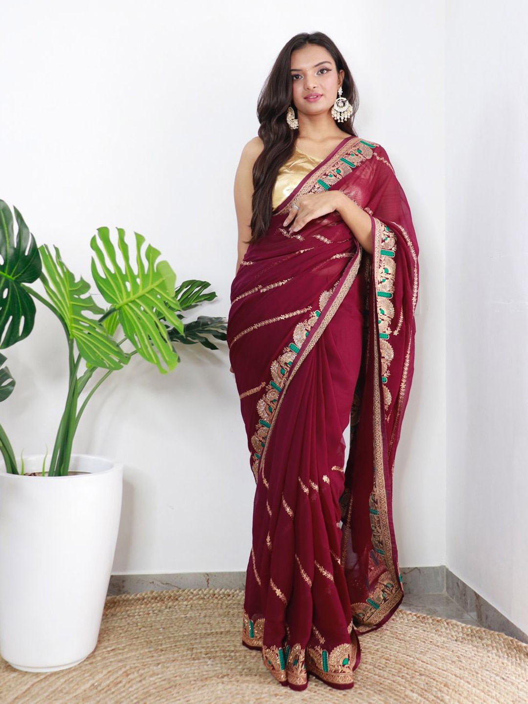 

Anouk Woven Design Zari Poly Georgette Saree, Maroon
