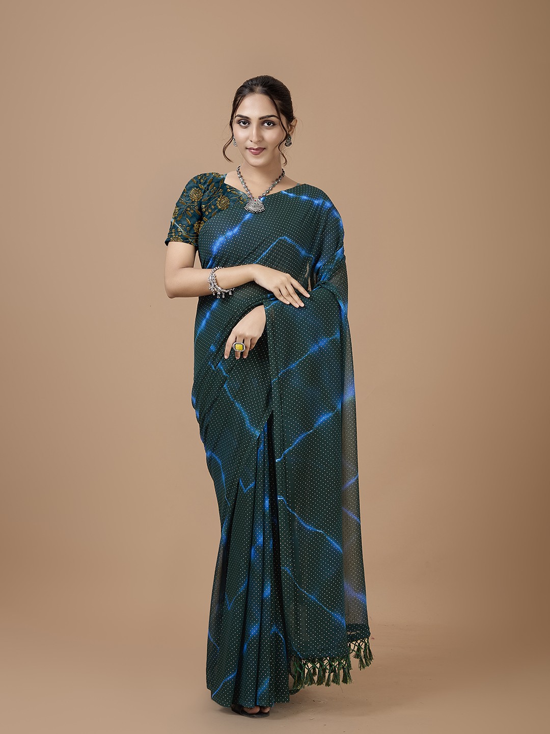 

A.V.M Prints Tie and Dye Sequinned Saree, Turquoise blue