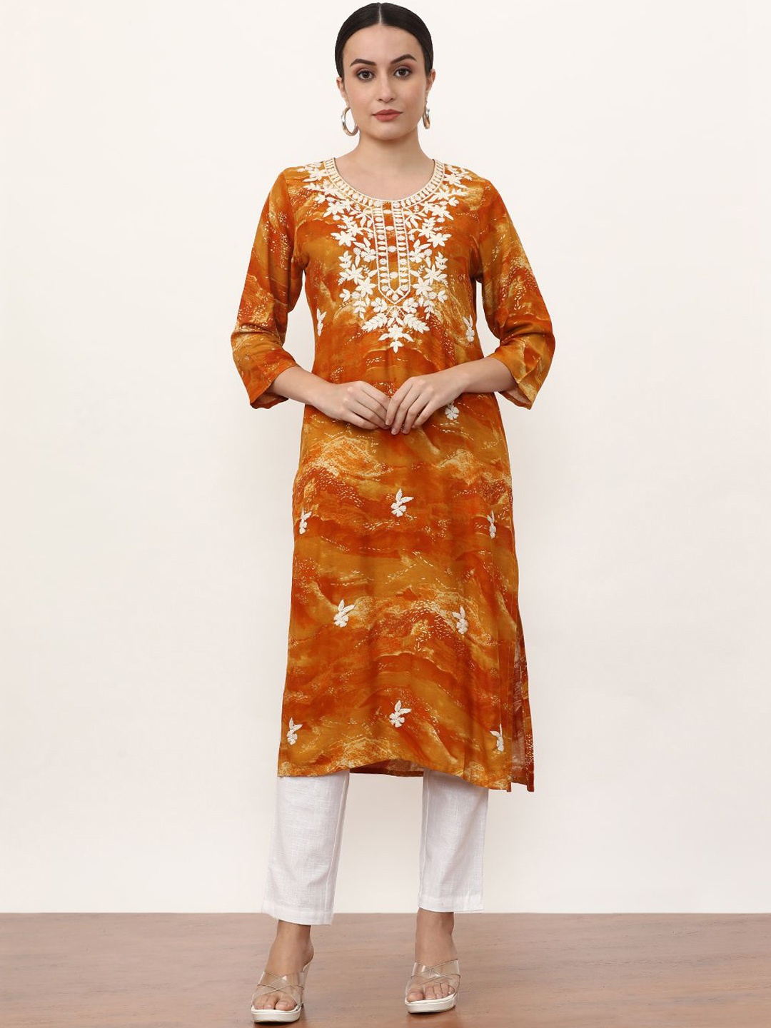 

Jaipur Kurti Women Floral Printed Thread Work Kurta, Mustard