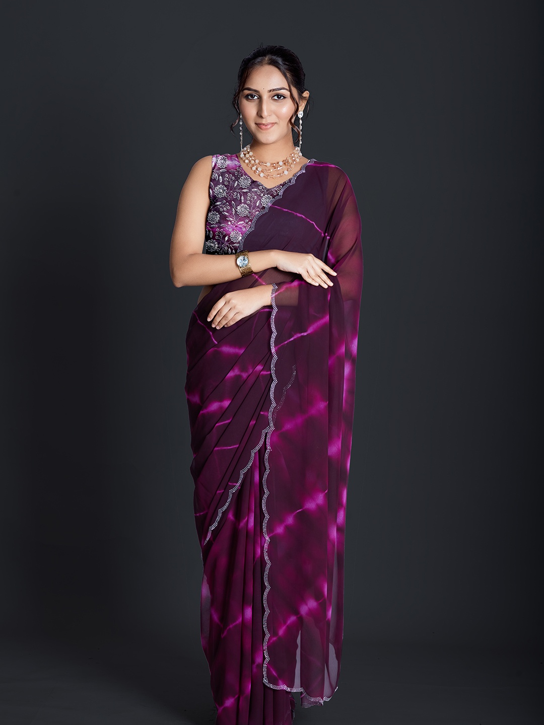 

A.V.M Prints Tie and Dye Sequinned Maheshwari Saree, Burgundy