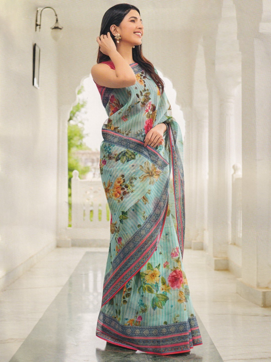 

Exotic India Floral Organza Saree, Turquoise blue