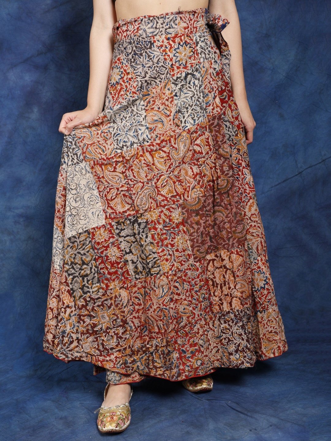 

Exotic India Rainbow Printed Pure Cotton Long Skirt With Patch Work, Red