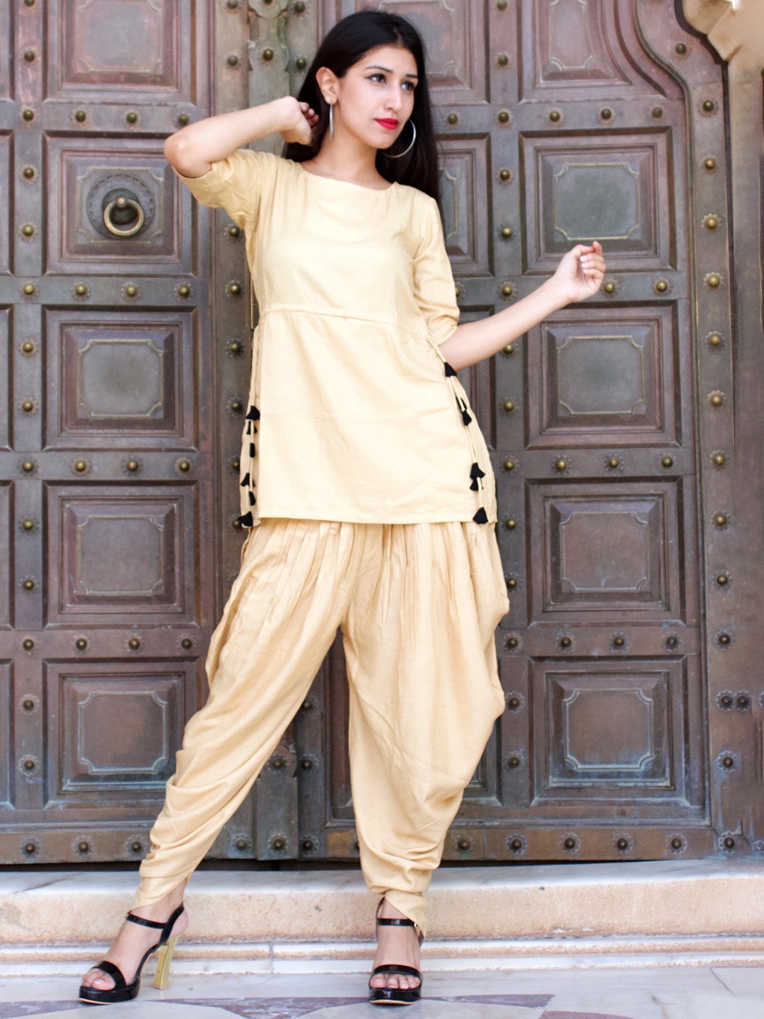 

Chandbaali Round Neck Three-Quarter Sleeves Short Kurti with Dhoti Pants, Beige