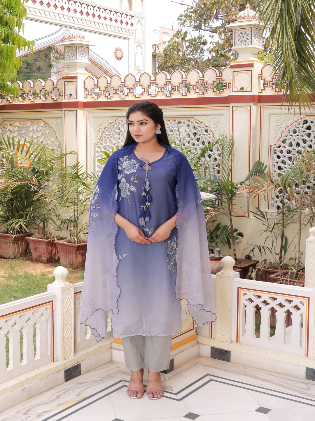 

VAASVA JAIPUR Floral Printed Tie-Up Neck Straight Kurta With Trousers & Dupatta, Blue