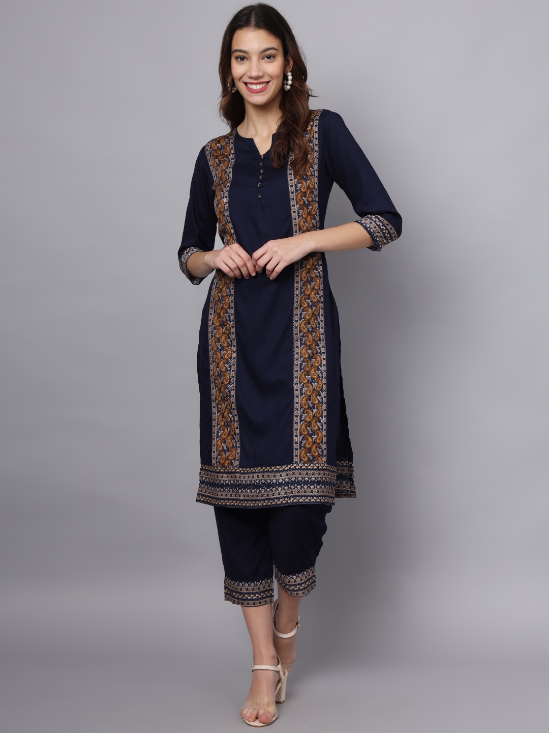 

Ojjasvi Women Floral Printed Regular Thread Work Kurta with Trousers, Navy blue