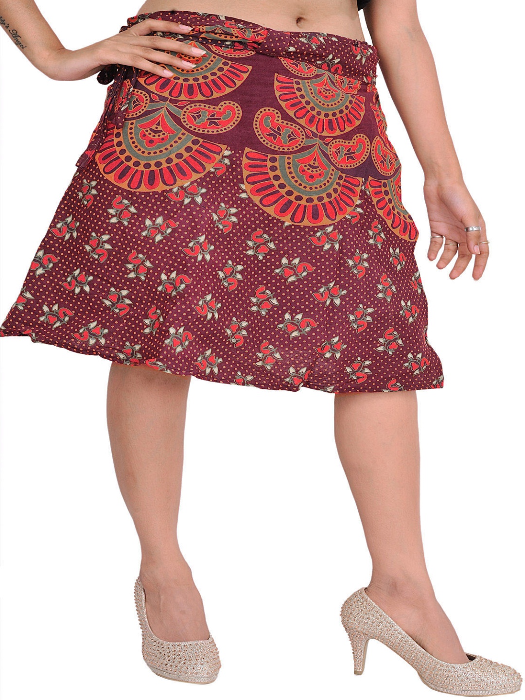 

Exotic India Printed Pure Cotton Wrap Knee Length Skirts, Red