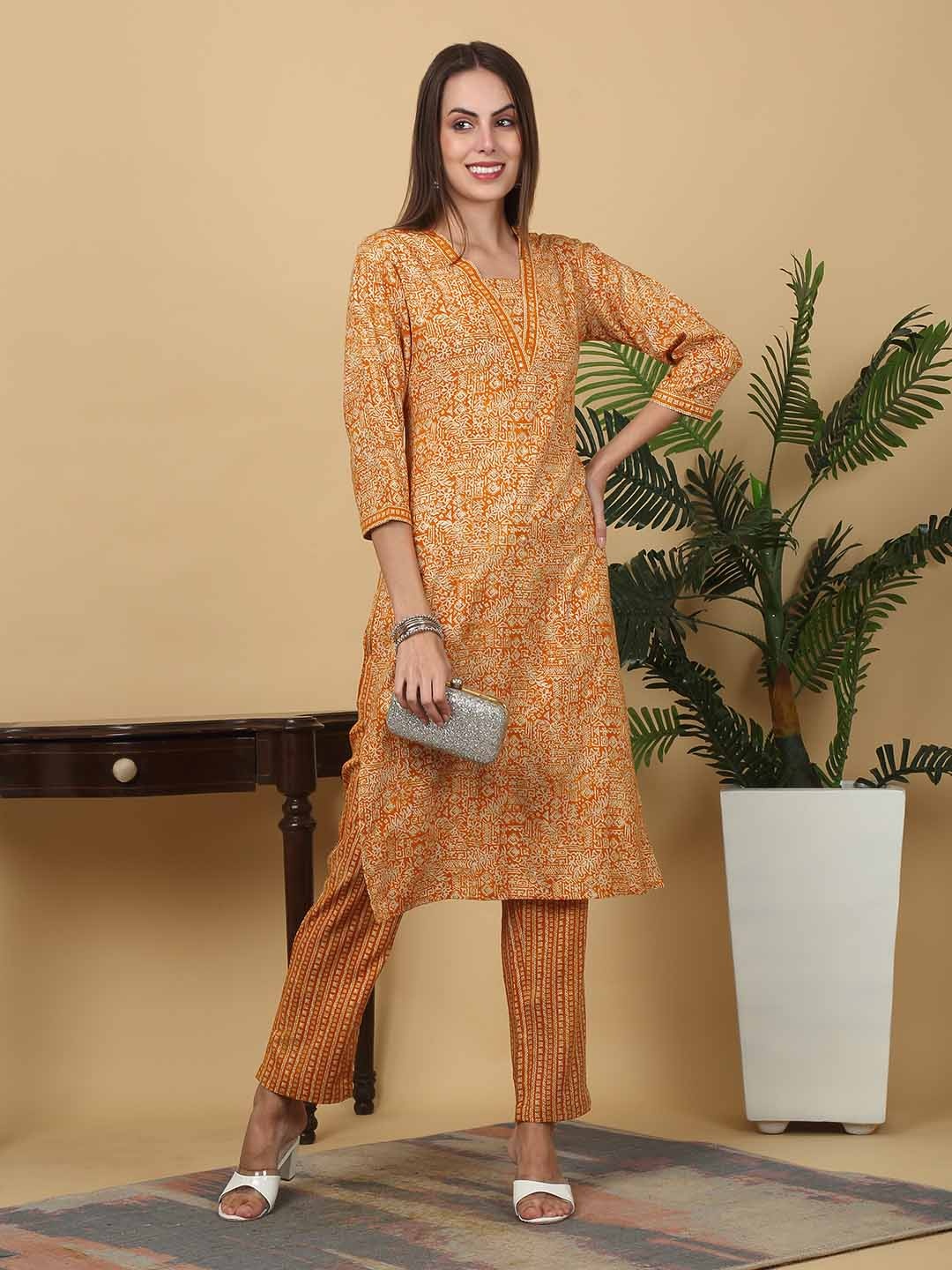 

KALINI Women Floral Printed Regular Mirror Work Kurta Sets, Mustard