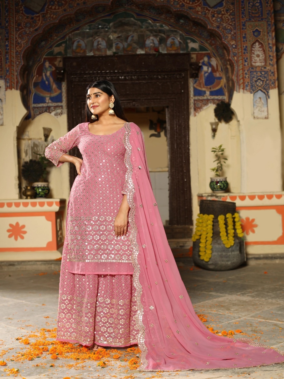 

Rujave Women Floral Embroidered Pleated Mirror Work Kurta with Sharara & With Dupatta, Pink