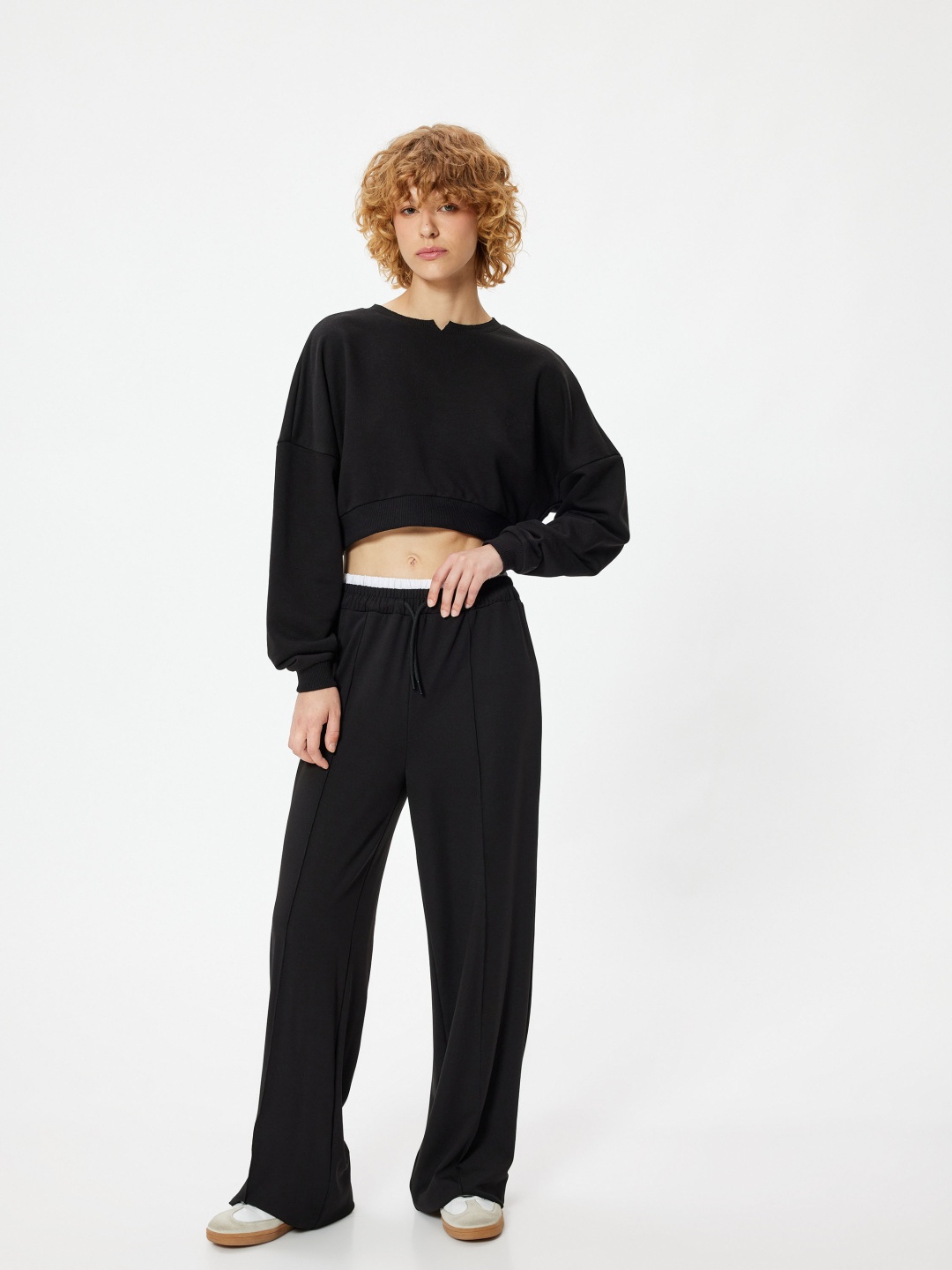 

Koton Women Round Neck Solid Pullover Crop Sweatshirt, Black