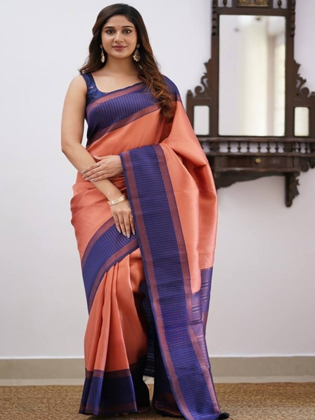 

Sanwariya Silk Woven Design Zari Kanjeevaram Saree, Orange