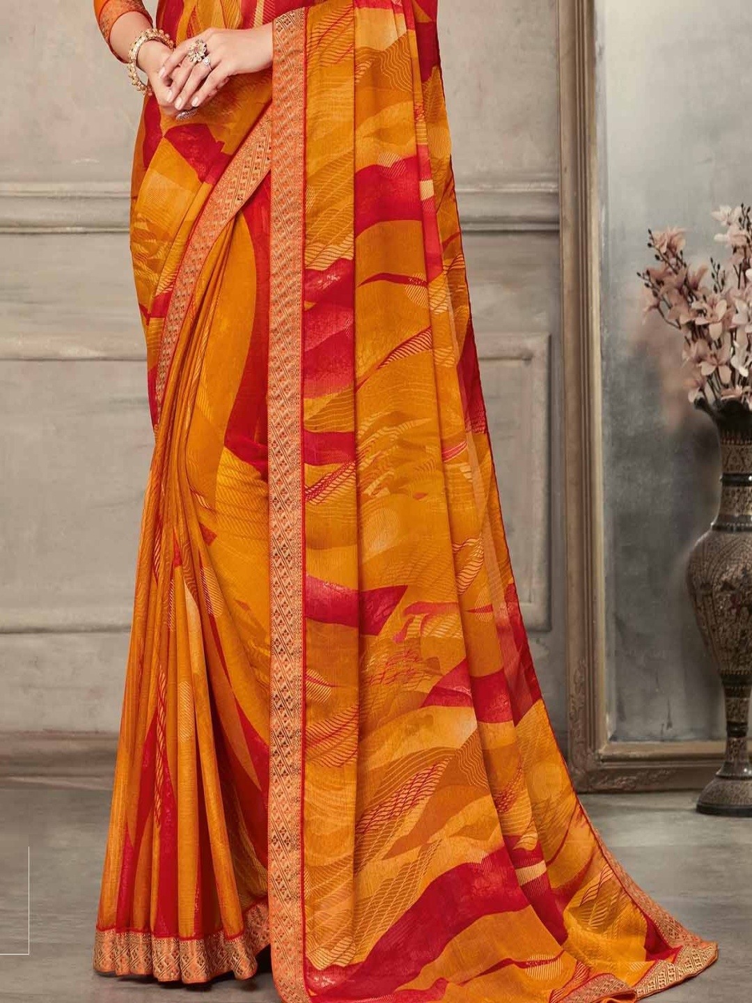 

Reboot Fashions Women Woven Design Pure Chiffon Saree, Yellow