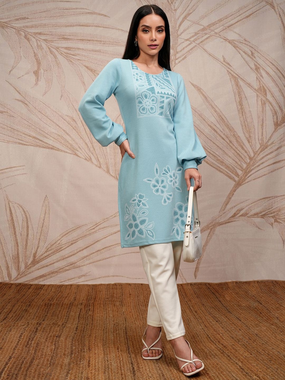 

Vishudh Blue Floral Printed Round Neck Puff Sleeves Straight Kurta