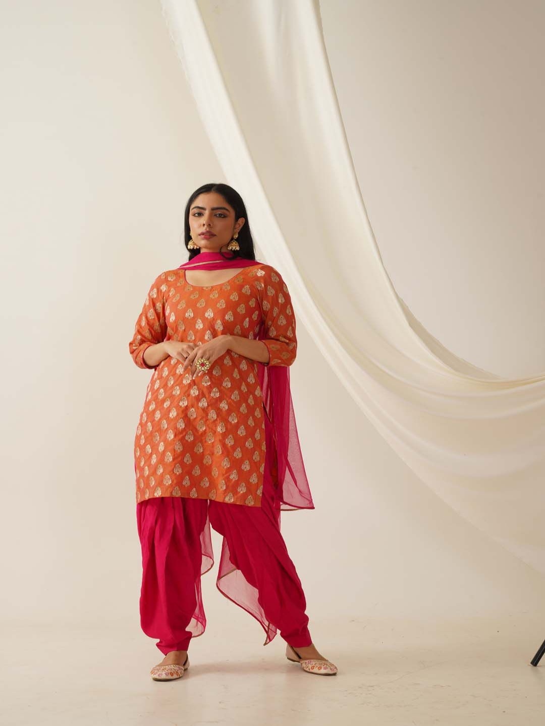 

Akshayini Ethnic Motifs Woven Design Banarasi Silk Straight Kurta With Patiala & Dupatta, Orange