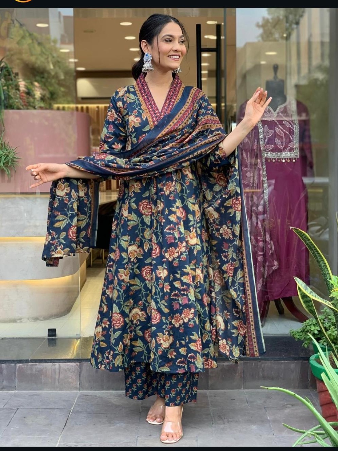 

S.K.C Floral Printed Pleated Mirror Work V-Neck A-Line Kurta With Trouser & Dupatta, Blue