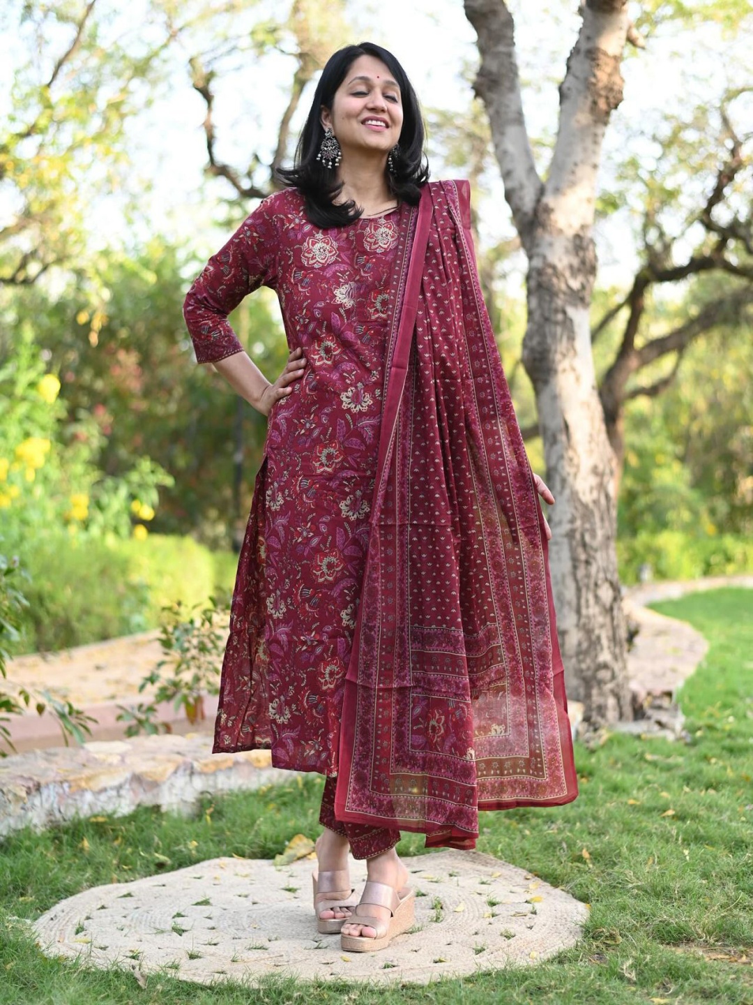 

GoSriKi Floral Printed Round Neck Straight Kurta With Trousers & Dupatta, Maroon