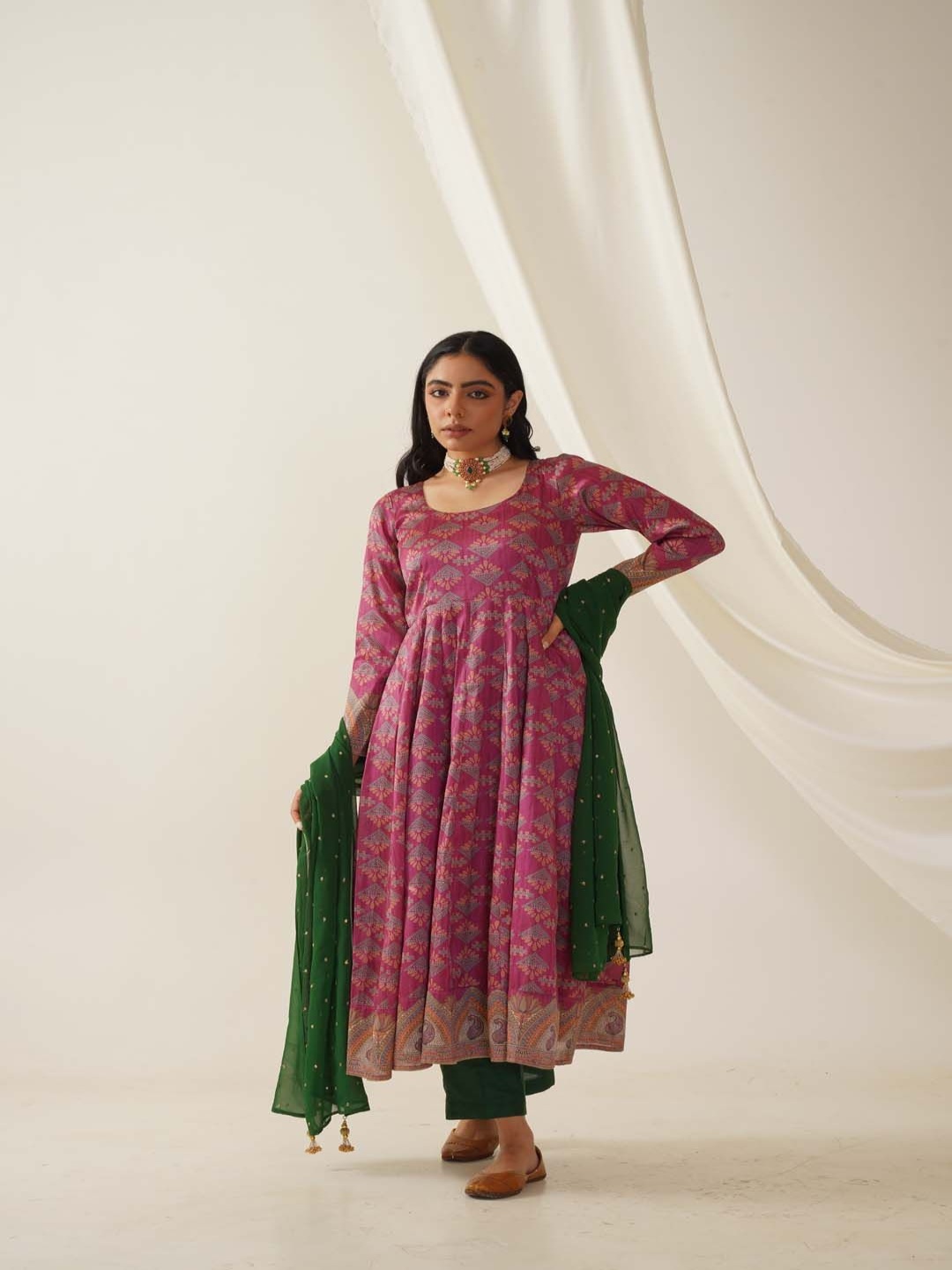 

Akshayini Ethnic Motifs Printed Mulberry Silk Anarkali Kurta With Trousers & Dupatta, Magenta