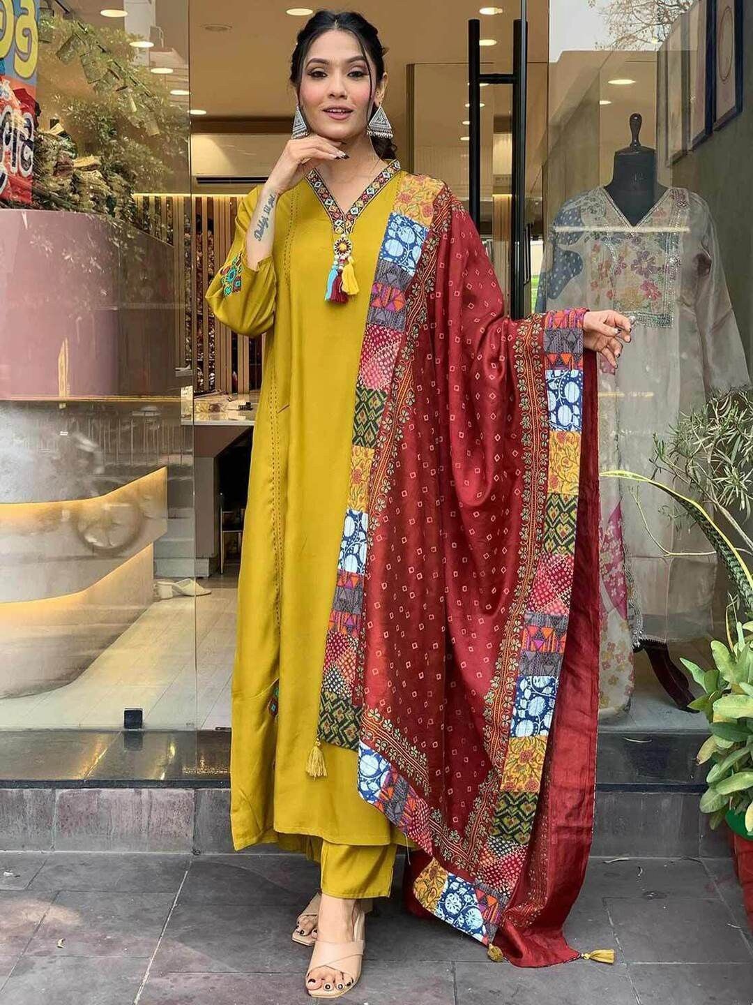 

REALLTREND Floral Printed Kantha Work V-Neck A-Line Kurta With Trouser And Dupatta, Mustard