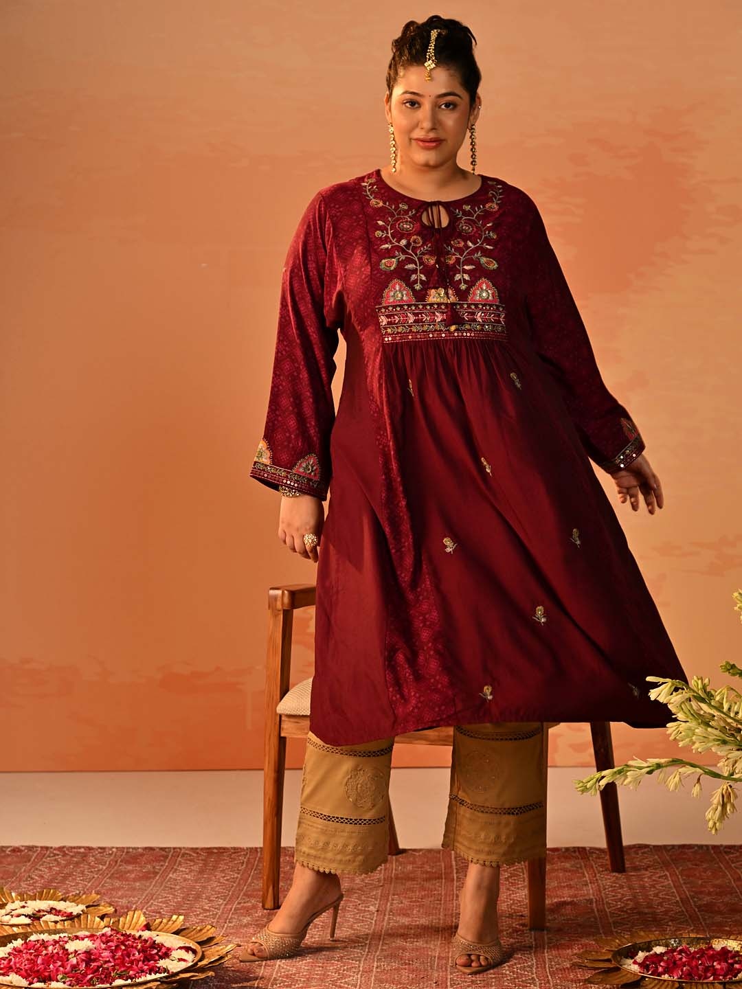 

Lakshita Floral Printed Thread Work Tie-Up Neck A-Line Kurta, Maroon