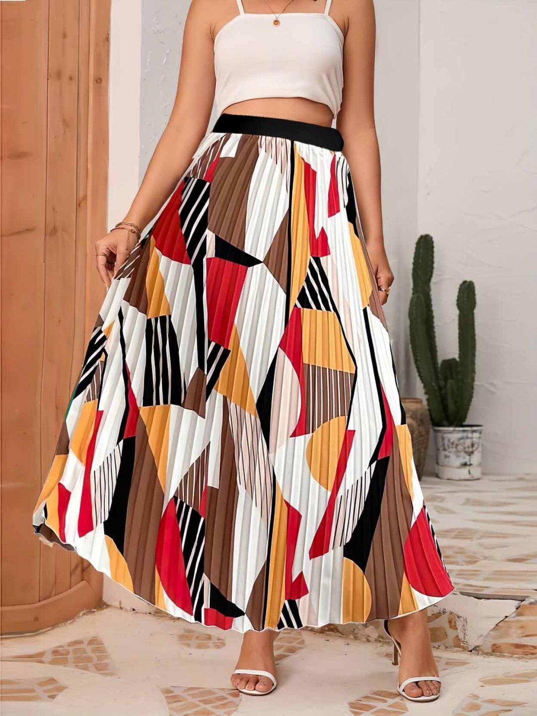 

Femvy Women Abstract Printed Flared Maxi Skirts, Yellow