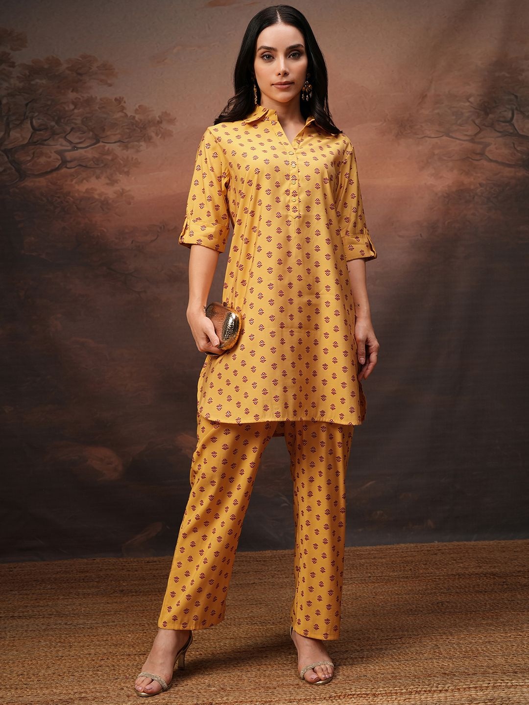 

Vishudh Mustard Printed Shirt Collar Three-Quarter Sleeves Tunic With Palazzo