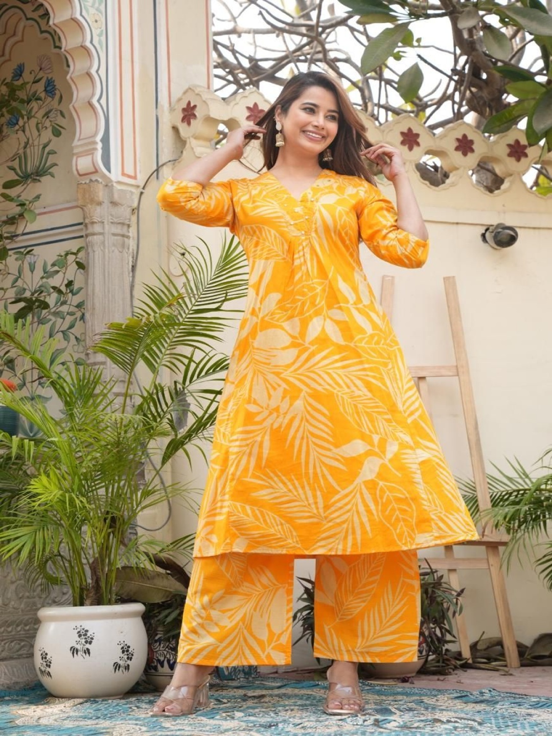 

QBO FASHION Floral Printed V-Neck Mirror Work A-Line Kurta with Palazzos, Yellow