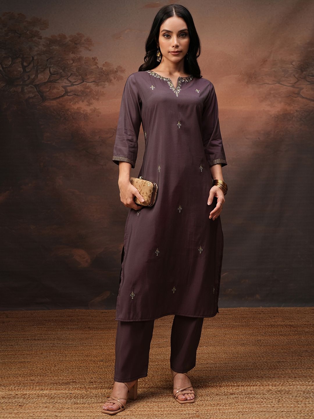 

Vishudh Burgundy Embroidered Round Neck Three-Quarter Sleeves Tunic & Trouser