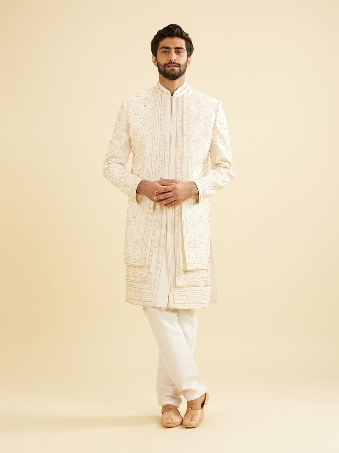 

Manyavar Men Embroidered Mandarin Collar Sherwani Set, Cream