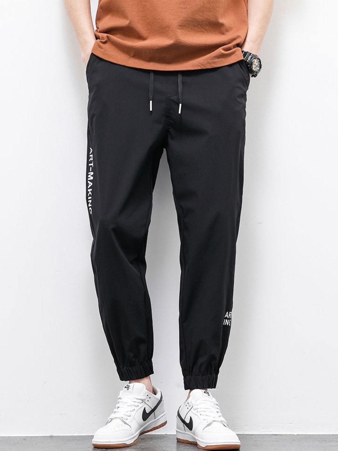 

StyleCast Men Printed Original Regular Fit Mid-Rise Trousers, Black
