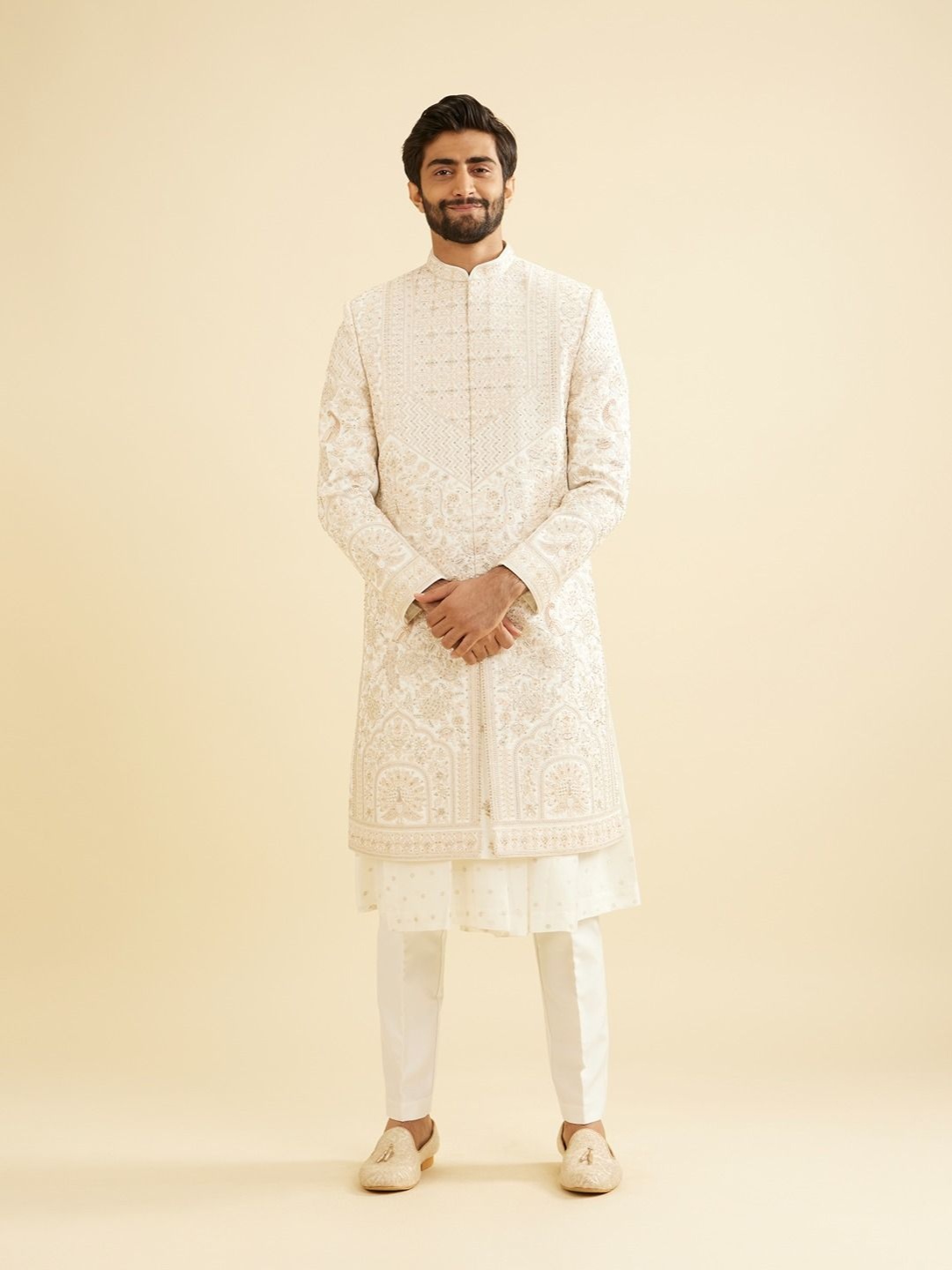 

Manyavar Men Thread & Stone Work Embroidered Sherwani Set, Beige