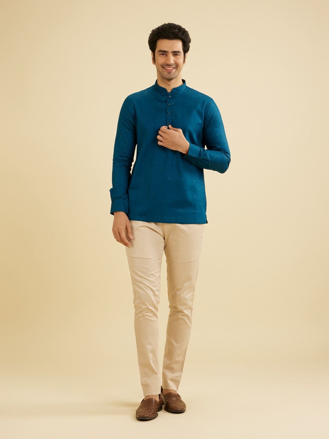 

Manyavar Men Self Design Short Kurta, Teal