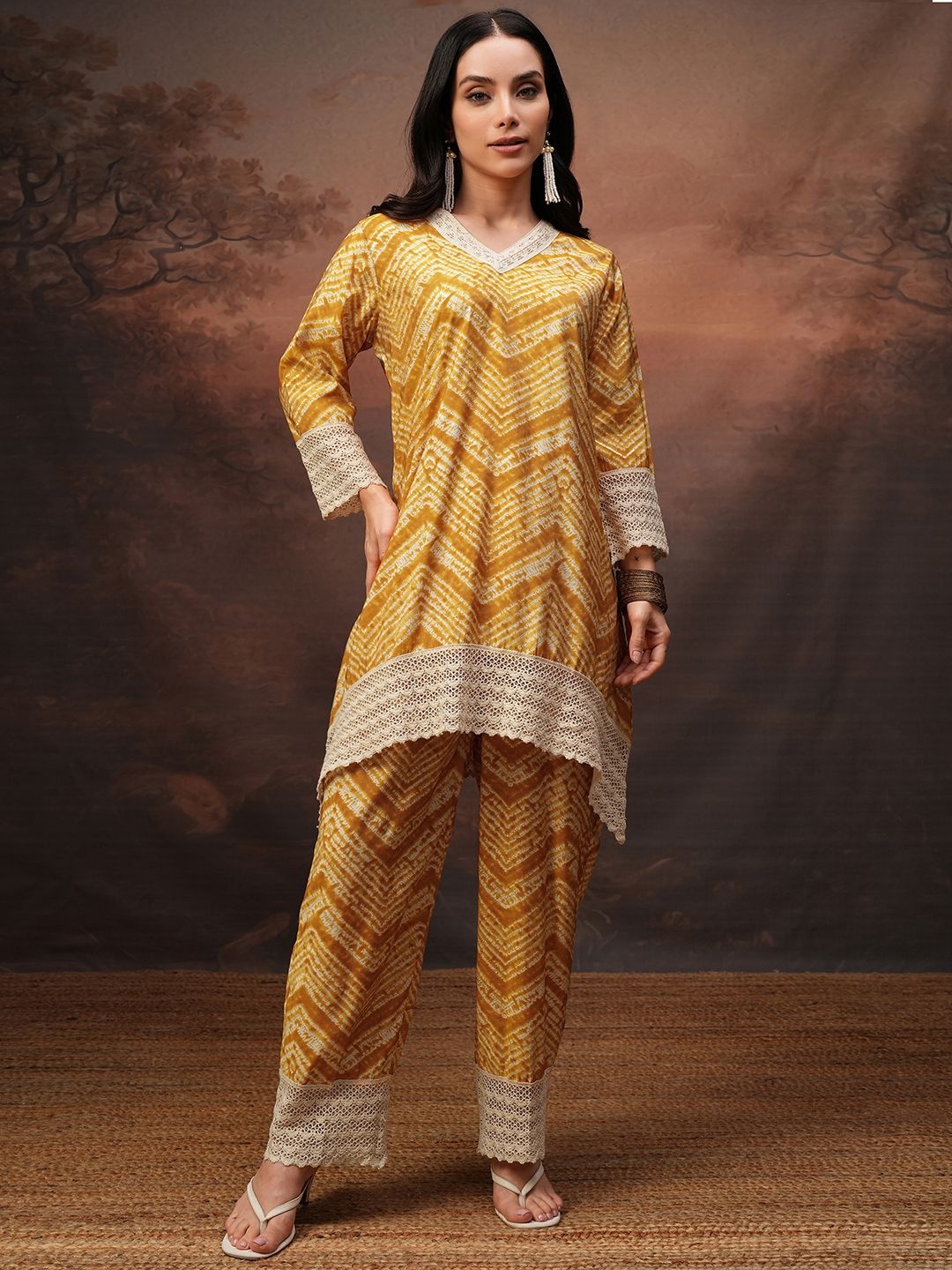 

Vishudh Yellow Printed V-Neck Three-Quarter Sleeves Tunic With Trouser