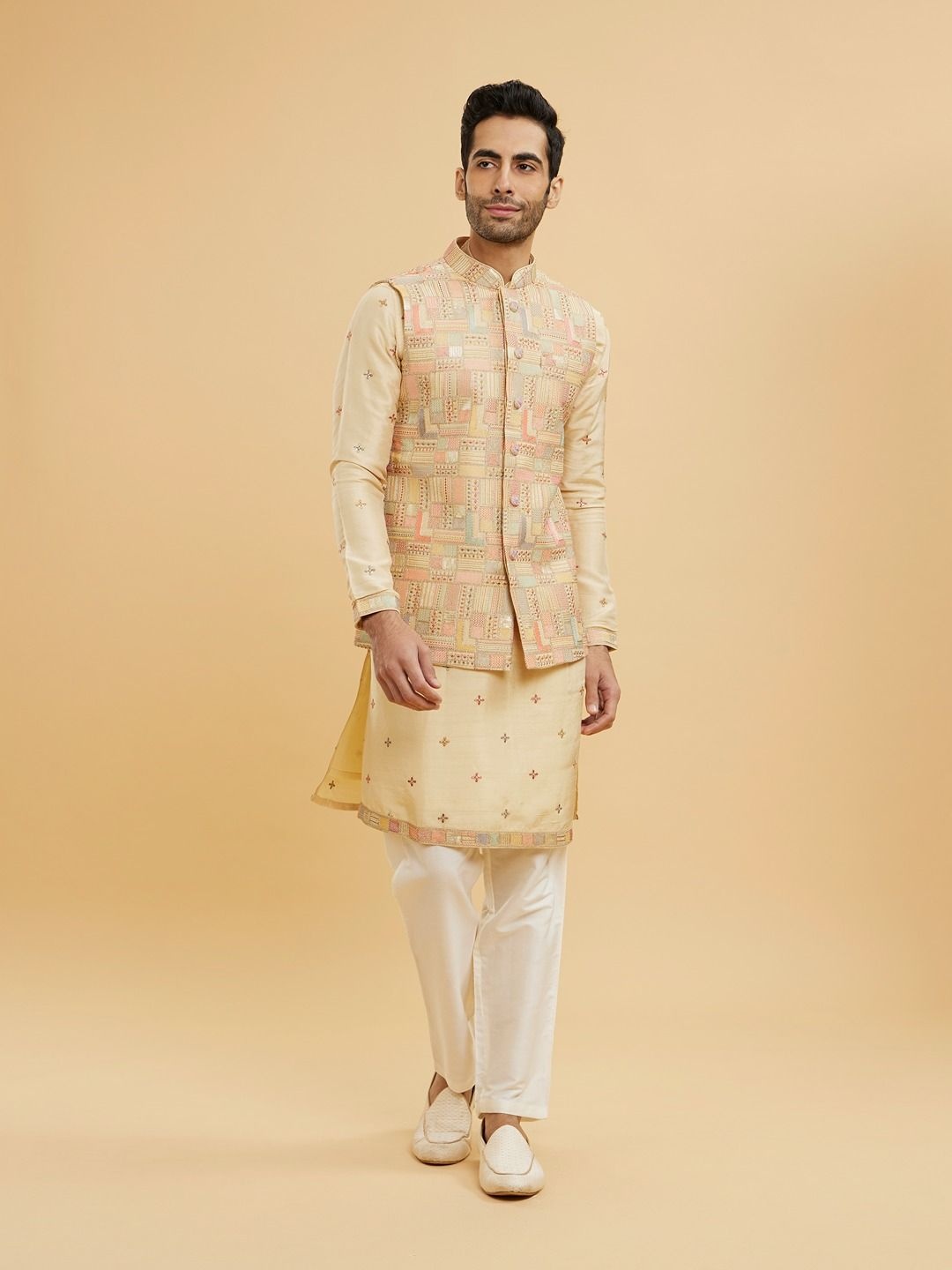 

Twamev Geometric Embroidered Mandarin Collar Straight Kurta With Trouser & Nehru Jacket, Beige