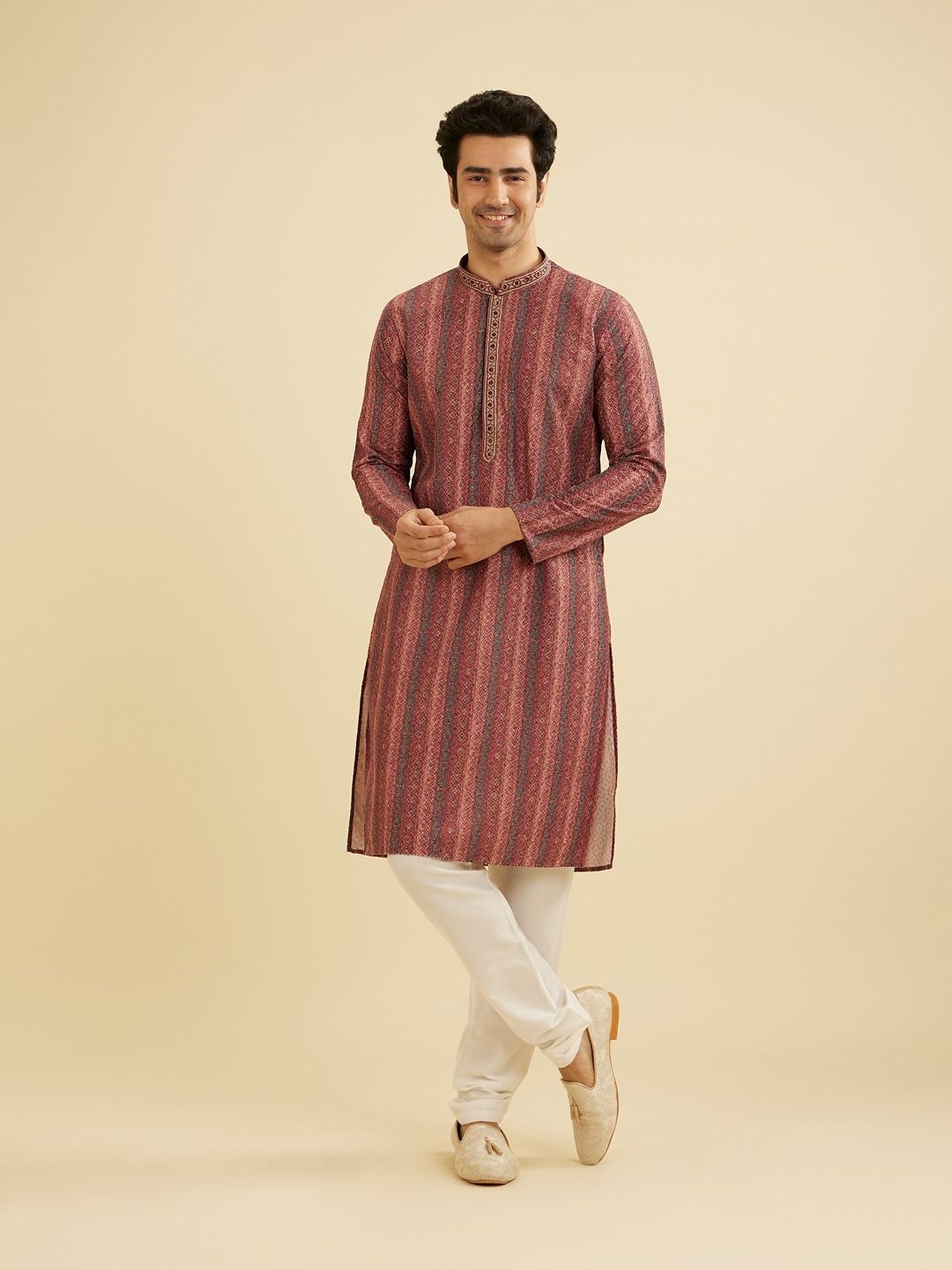 

Manyavar Ethnic Motifs Embroidered Sequinned Mandarin Collar Straight Kurta With Churidar, Rust