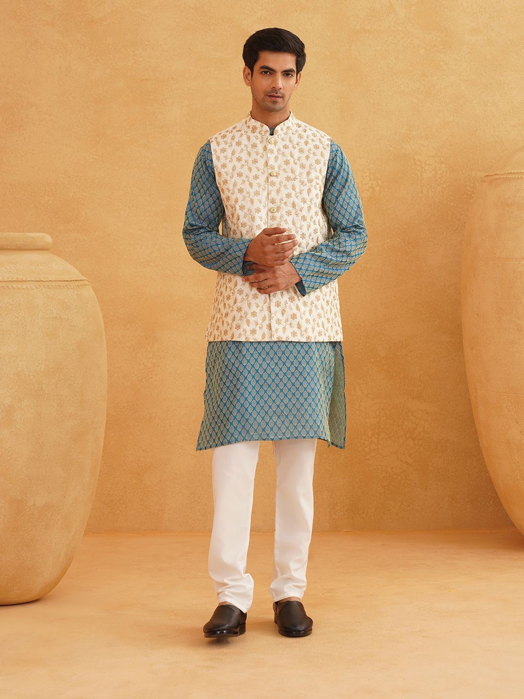 

SOJANYA Ethnic Motifs Printed Mandarin Collar Kurta With Churidar And Nehru Jacket, Blue